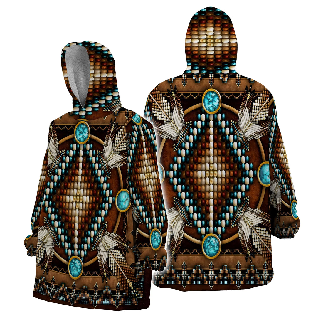 A woman standing front-facing in an oversized brown blanket hoodie decorated with turquoise geometric medallions, hands in pockets and smiling.