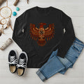 A black long-sleeve t-shirt with a vibrant Native American Thunderbird graphic, laid flat with a pair of jeans.