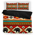 Close-up view of the intricate tribal bear pattern on the Native American inspired bedding set