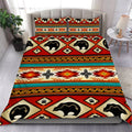 Bedroom setup featuring Native American tribal bear bedding set on a tufted bed