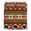 Front view of Native American inspired tribal bear bedding set with vibrant red, black, and turquoise patterns