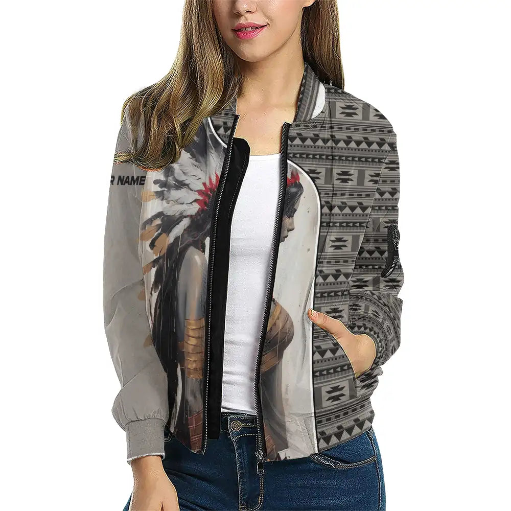 Woman wearing Native American inspired bomber jacket with side profile female chief and geometric tribal pattern