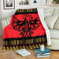 Close-up view of Pacific Native American Tribal Blanket displaying detailed geometric shapes and vivid colors.