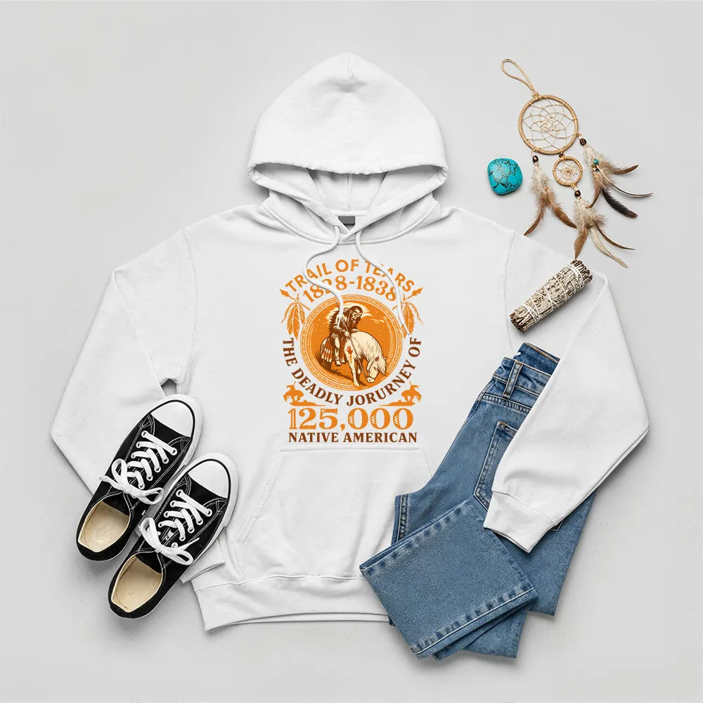 A white hoodie featuring the "Trail of Tears" graphic, laid flat with jeans and black sneakers.