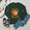 A forest green long-sleeve t-shirt with an indigenous-inspired 
