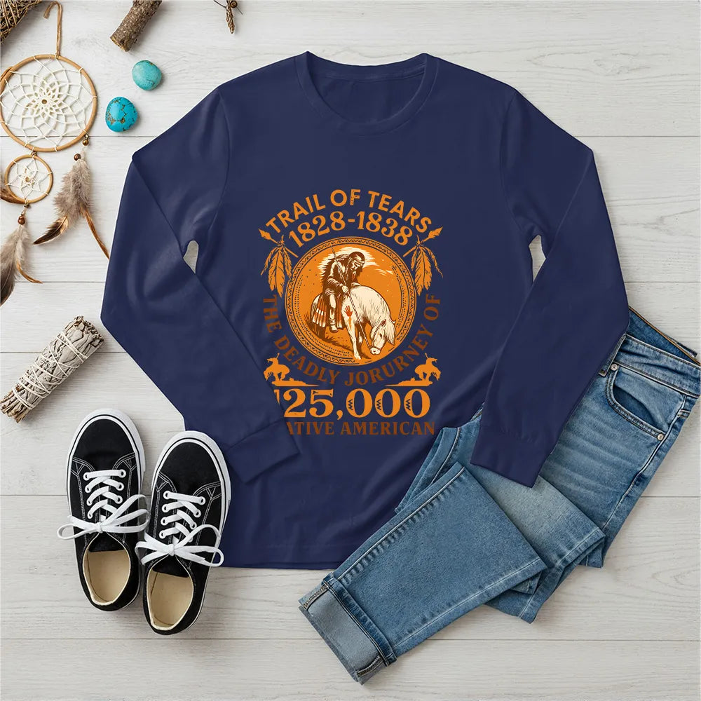 A navy blue long-sleeve t-shirt with the "Trail of Tears" commemorative print, arranged with a dreamcatcher and turquoise stones.