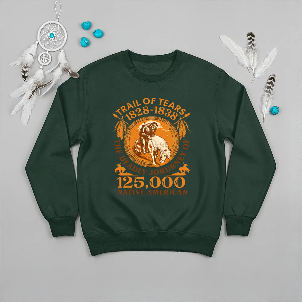 A forest green sweatshirt with the "Trail of Tears" historical graphic, laid flat with Native American symbols.