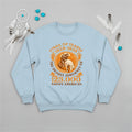 A light blue sweatshirt featuring the 