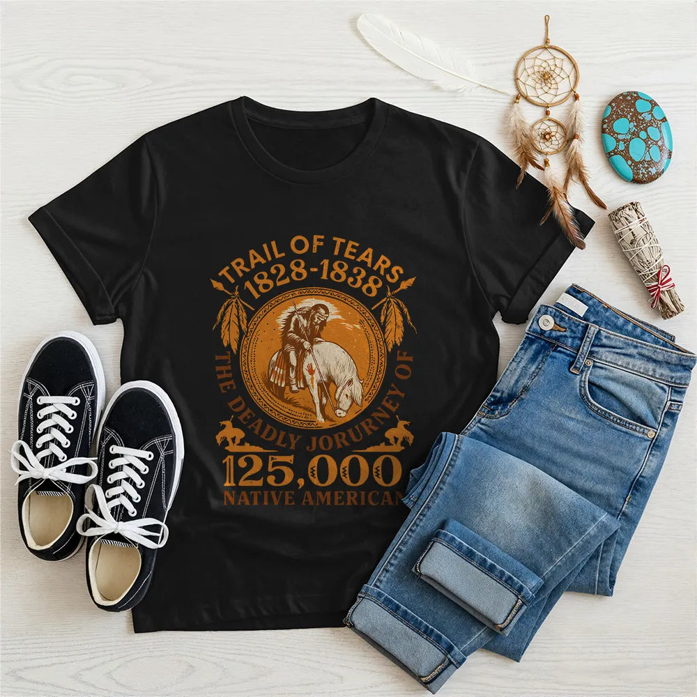 A black t-shirt showcasing the "Trail of Tears" historical design, styled with jeans and sneakers.