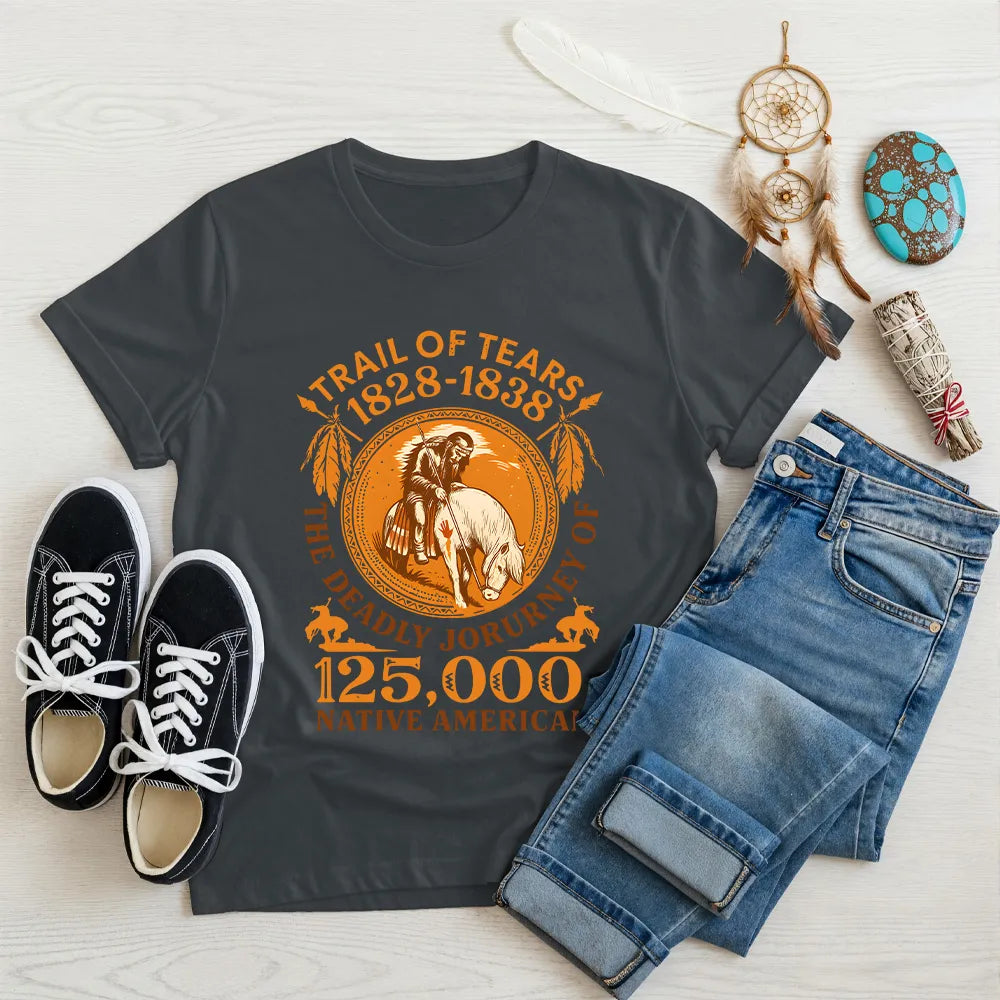 A dark grey t-shirt with the "Trail of Tears" historical graphic, presented with jeans and black sneakers.