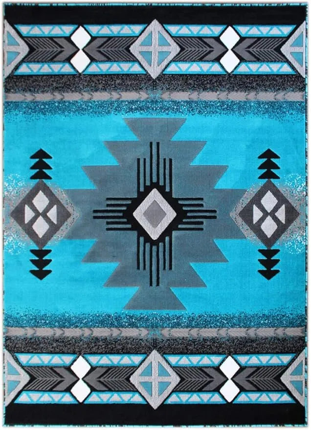 Close-up of the low-pile texture and vibrant turquoise, gray, and black geometric border on the Southwestern rug.