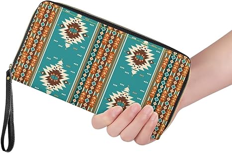 Woman holding turquoise Southwest tribal zip-around wallet to show size and fit